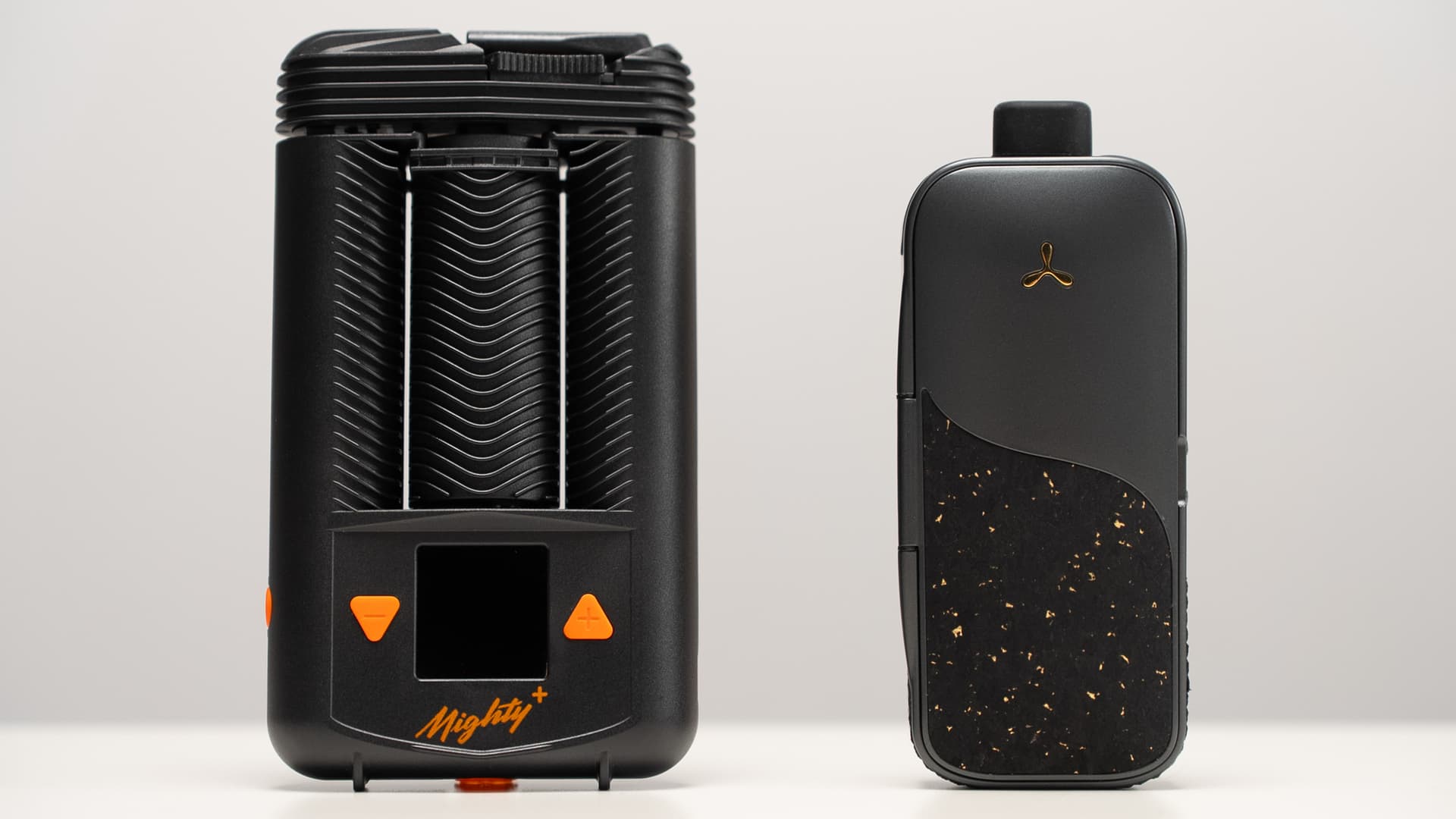 AirVape Legacy Pro 2 beside the Mighty+ showing relative size and build differences