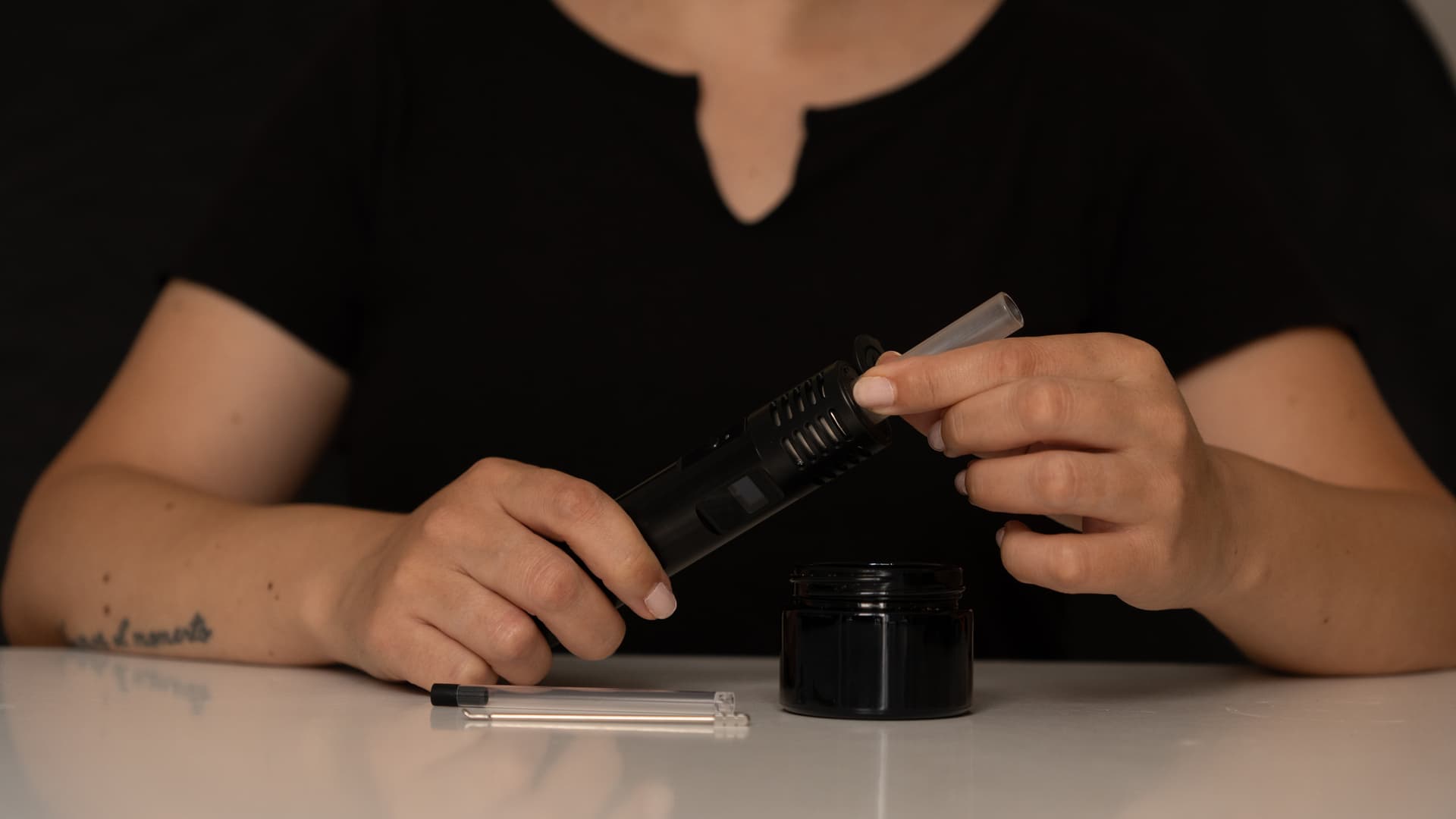 Removing the glass stem from the Air Max over a table