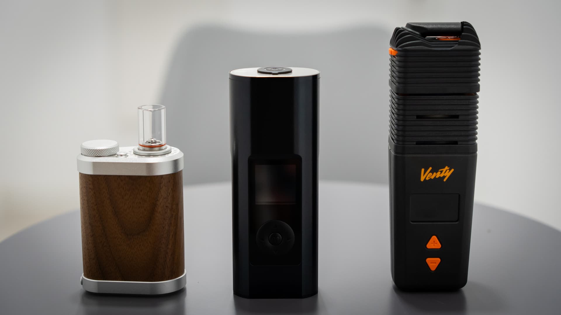 Three portable vaporizers lined up for side-by-side comparison testing