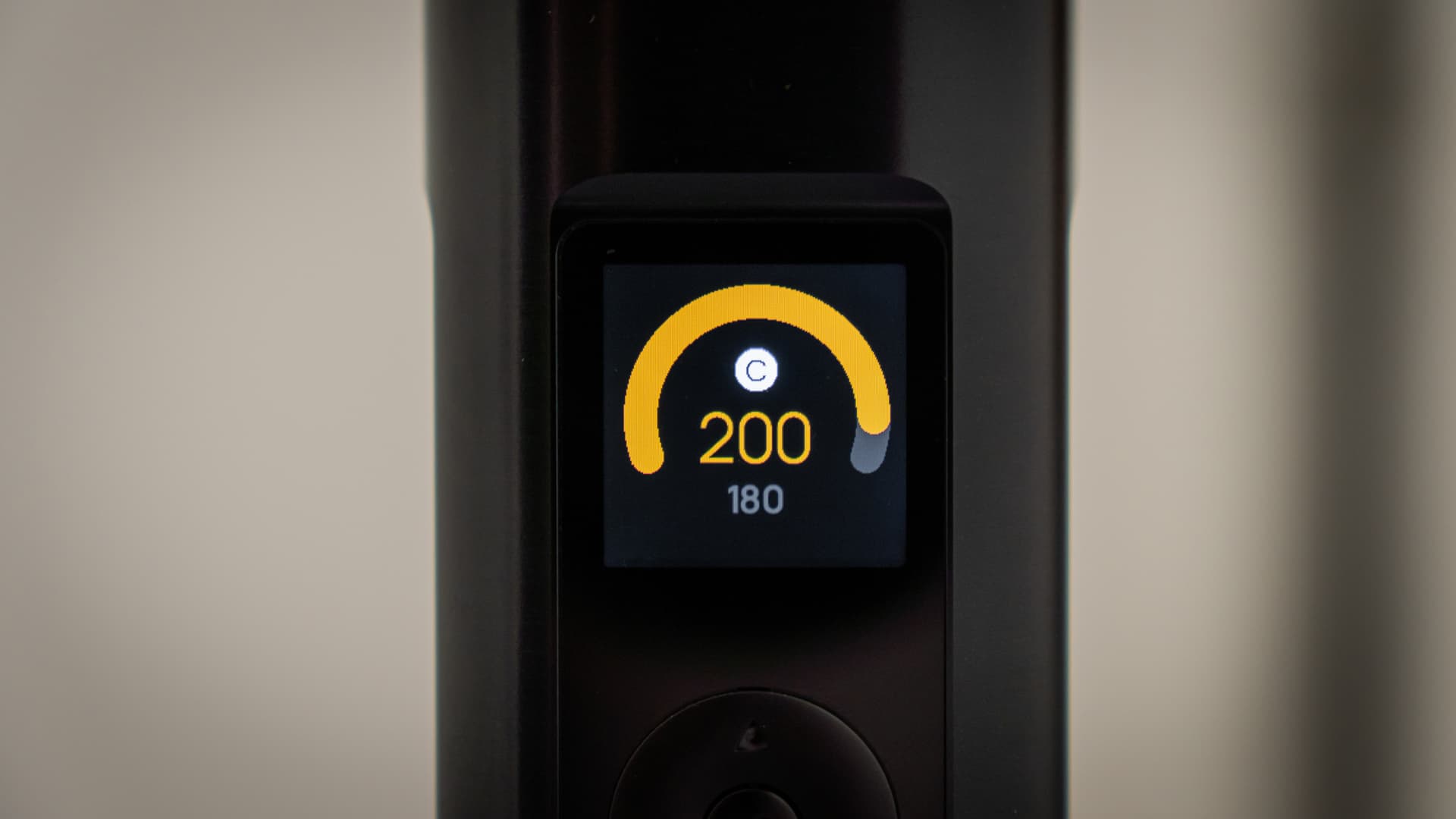 Close-up of a vaporizer's digital display showing a precise temperature setting in one-degree increments