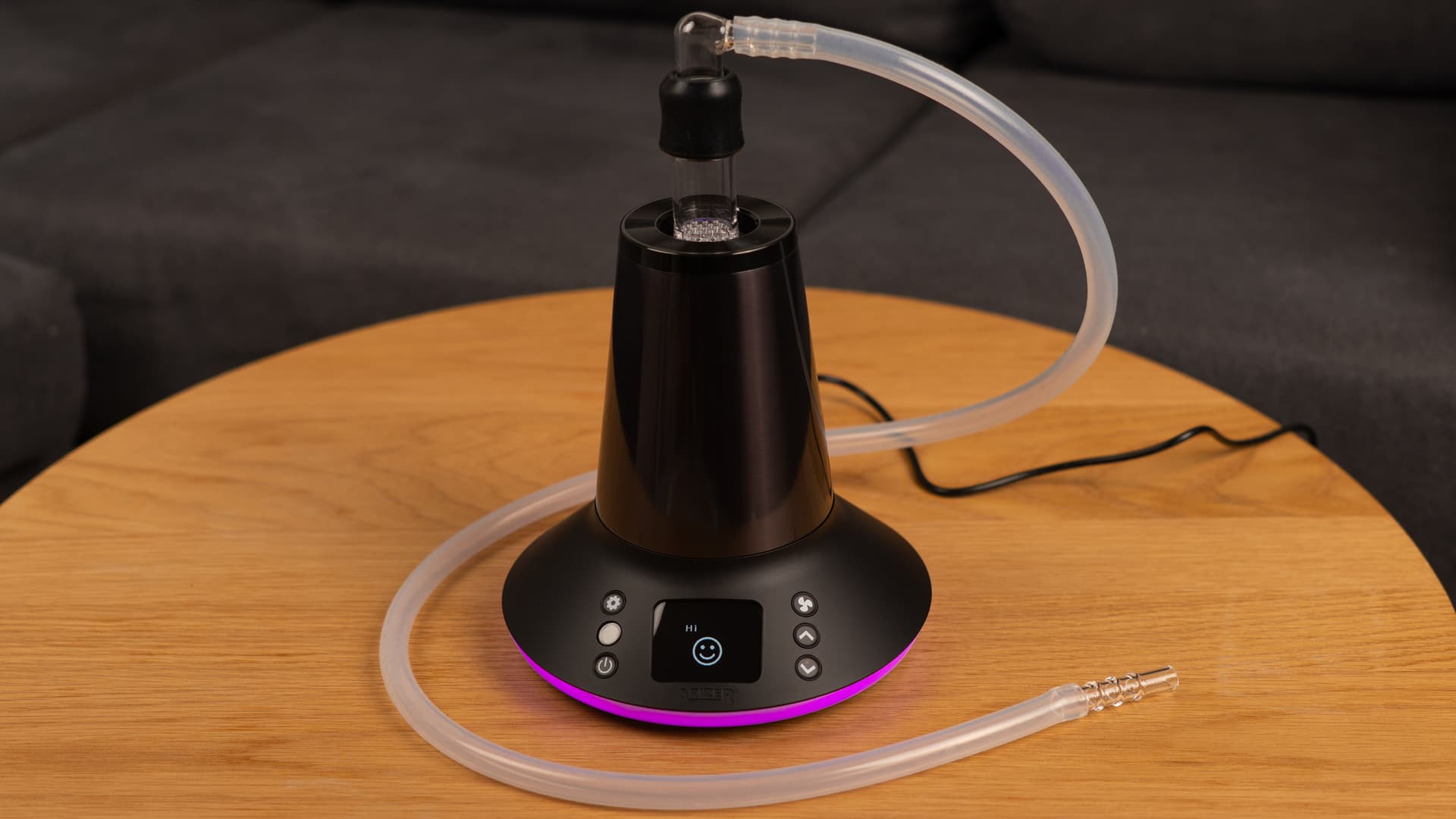 Arizer XQ2 assembled in whip mode with purple LED ring and smiley face on display
