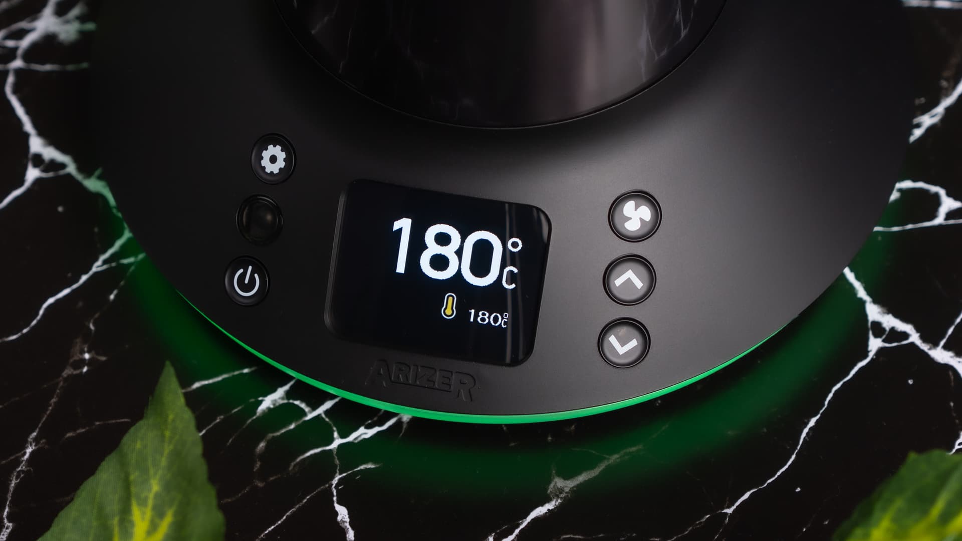 Close-up of Arizer XQ2 display showing 180°C temperature setting with green LED ring