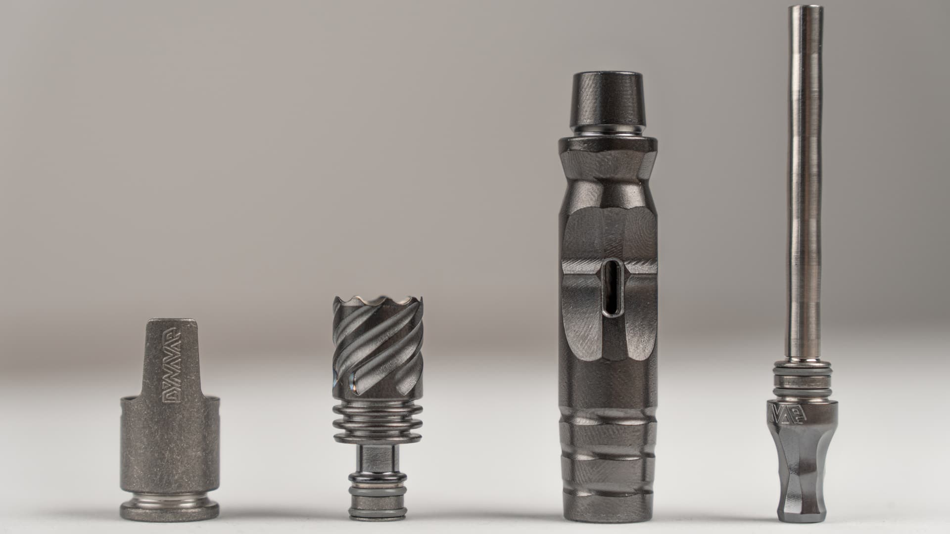 HyperDyn parts laid out: Hyper Cap, Hyper Tip, condenser mouthpiece and stem