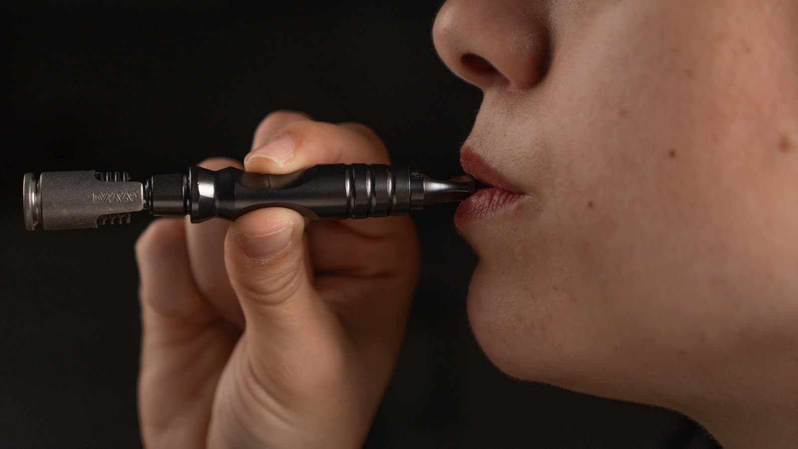Taking a draw from the HyperDyn mouthpiece