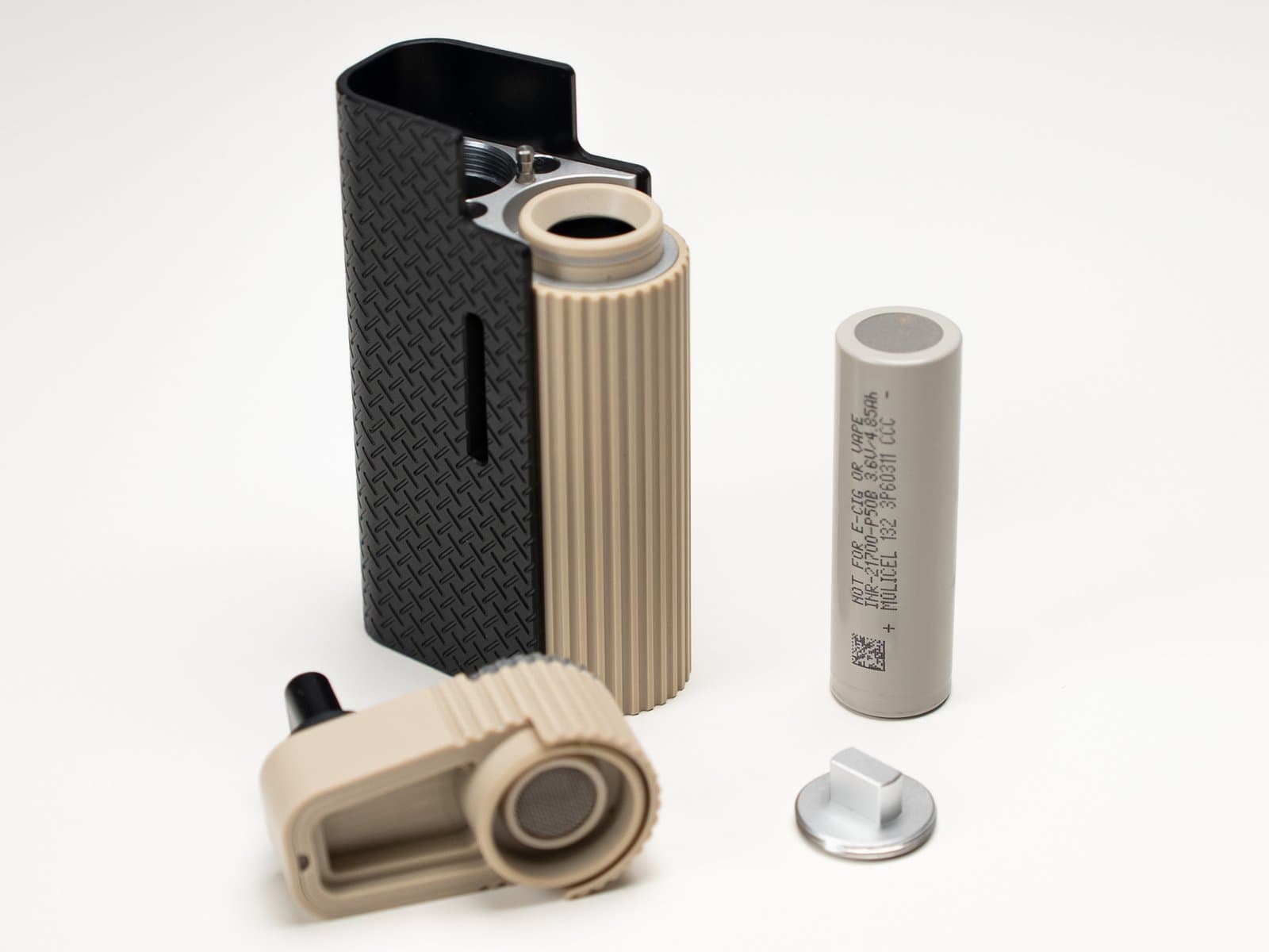 Frolic Vaporizer zerlegt in Ultem- und PEEK-Gehäuse, Molicel 21700-Akku, Kühleinheit mit Mesh-Sieb und silberne Akkukappe