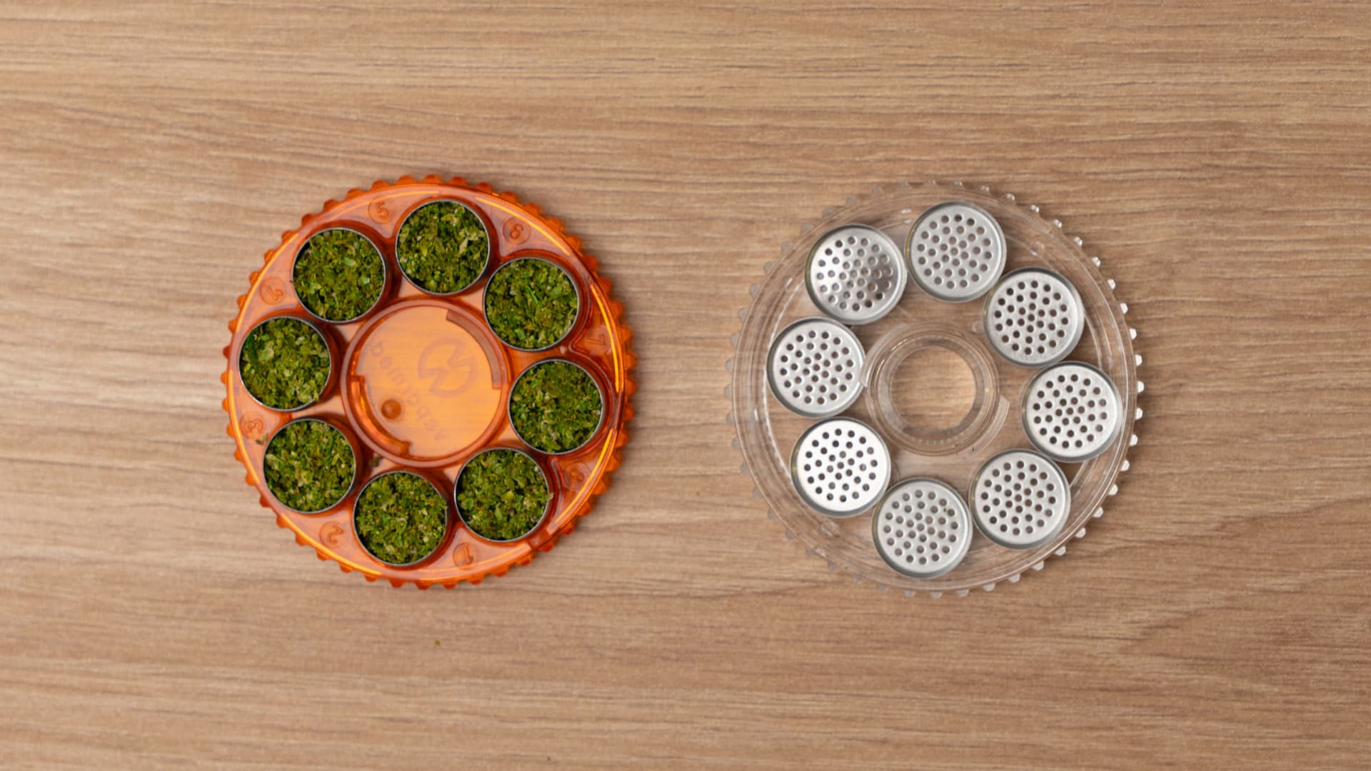 A 40-capsule dosing magazine fully loaded with ground cannabis on a wooden surface