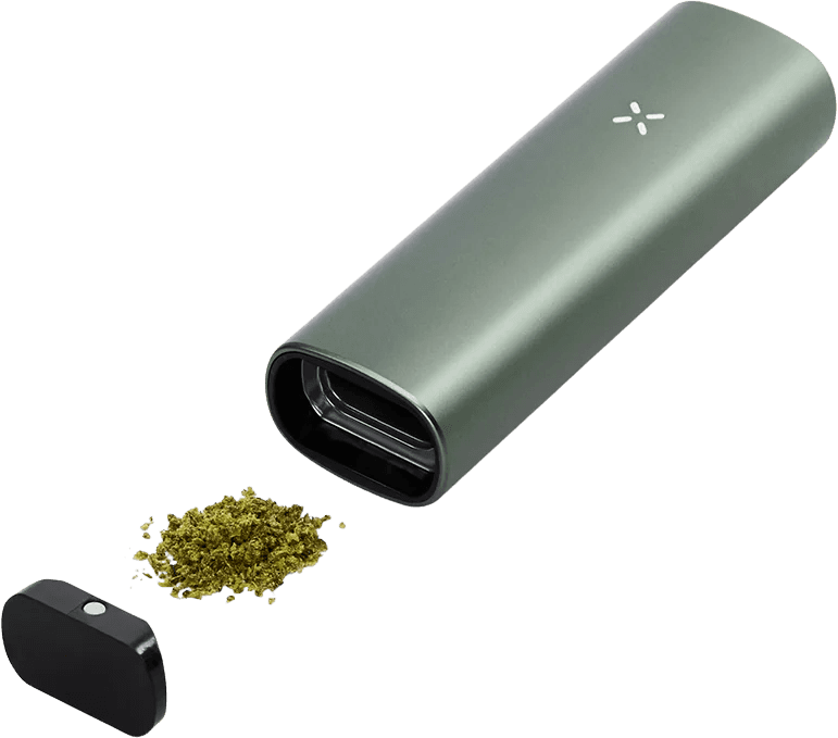 Green PAX 3 with oven lid removed showing open chamber and ground cannabis
