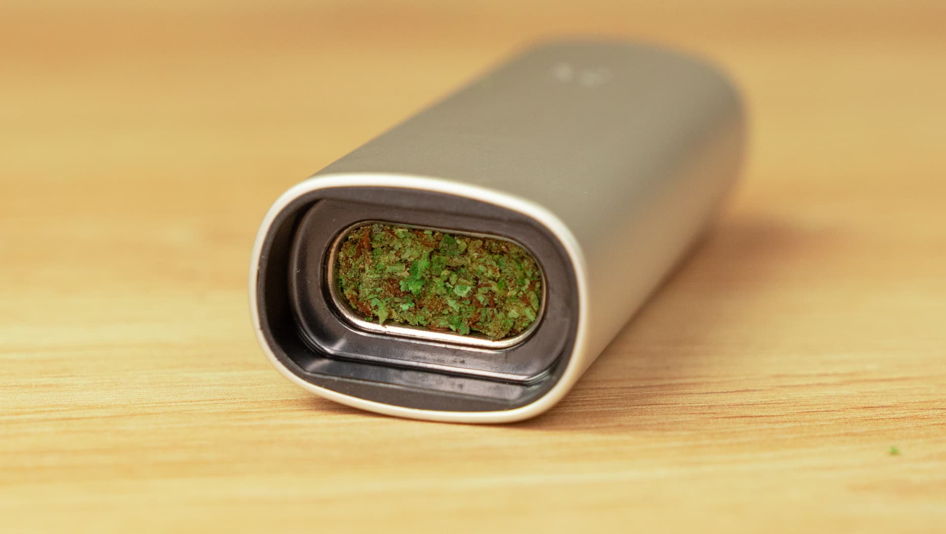 PAX Mini conduction oven packed tightly with fine-ground cannabis