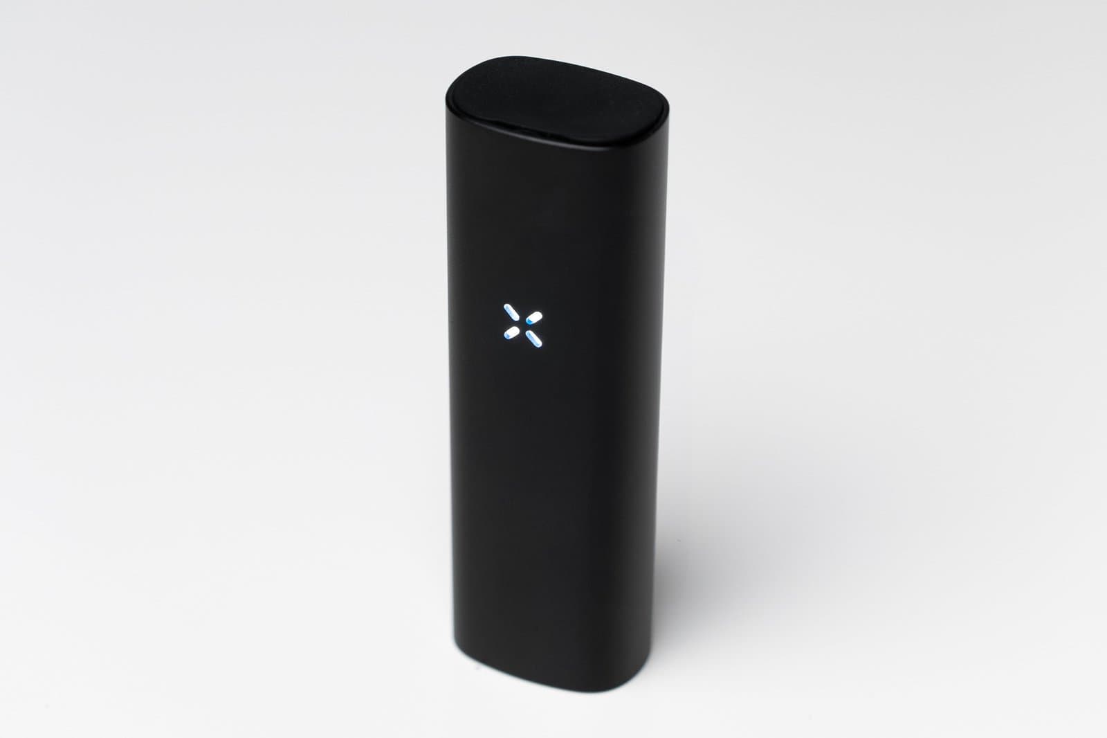 Black PAX Mini 2 standing upright with its petals lit