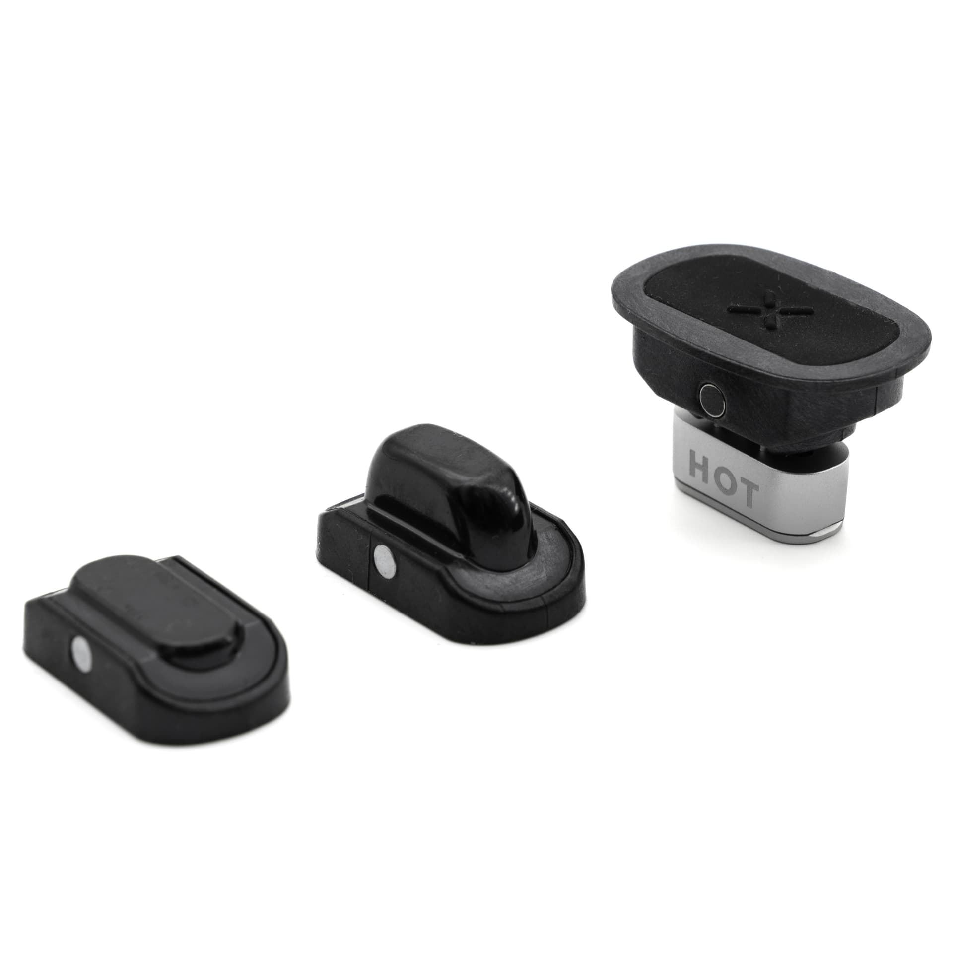 Flat and raised PAX Plus mouthpieces beside the concentrate insert