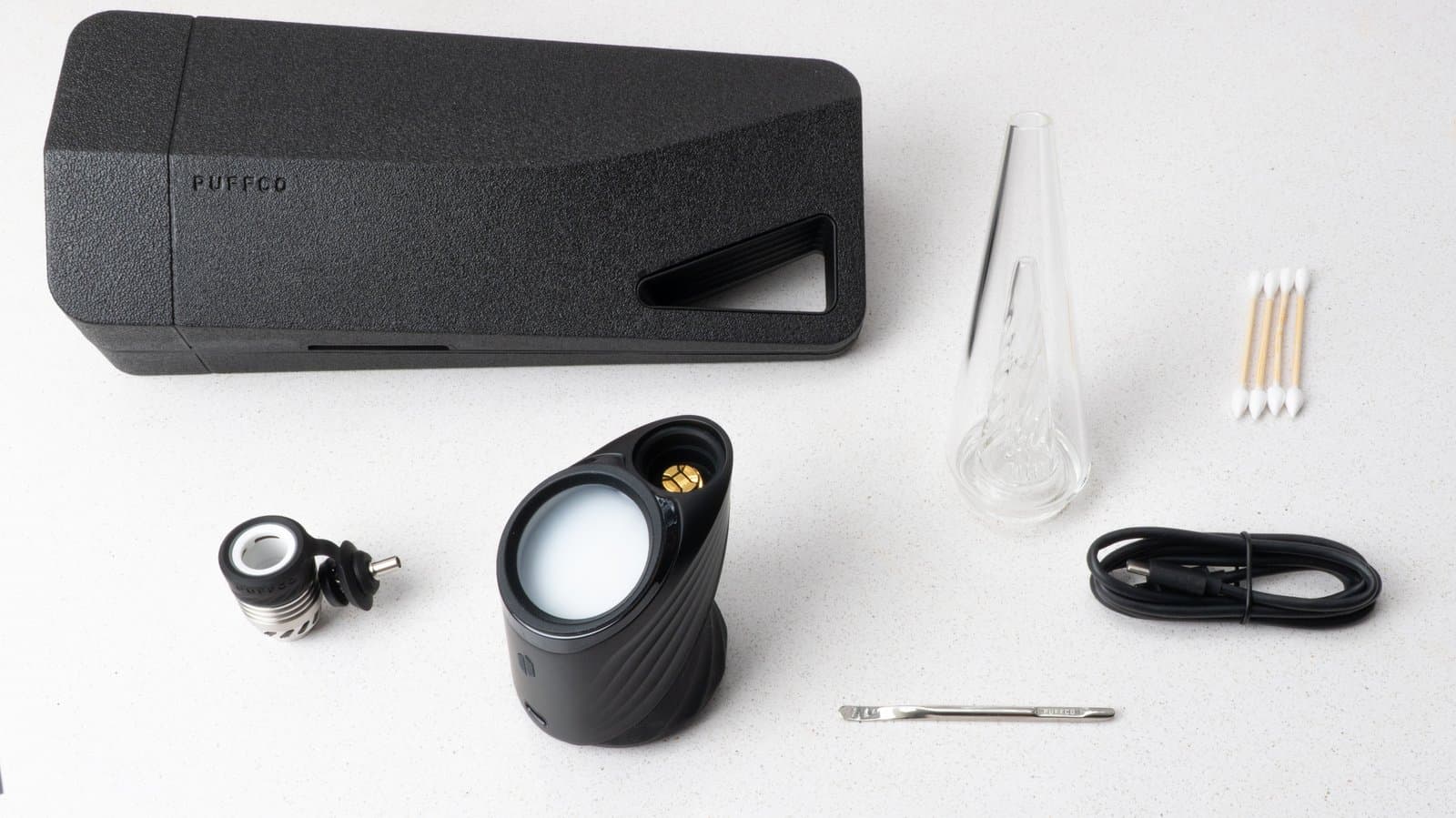 Peak Pro-Set flach ausgebreitet mit Etui, Glas, Wattestäbchen, Kabel und Werkzeug