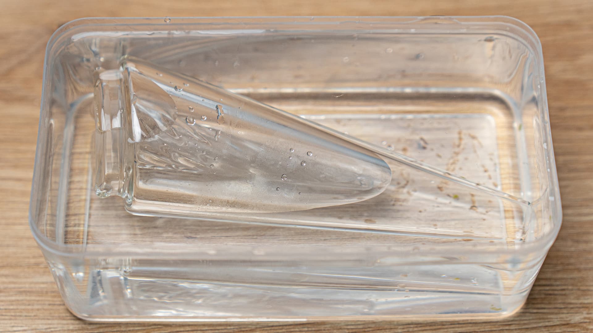 Detached Peak Pro glass in a soaking tray