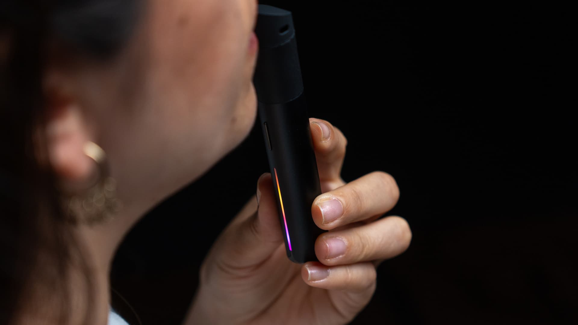 Person drawing from the Pivot with a multicolored light bar