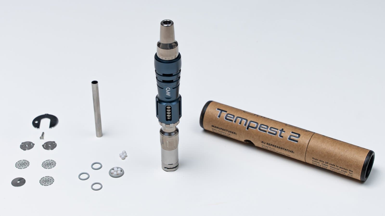 Tempest 2 unboxed beside its shipping tube with spare screens, O-rings, zirconia balls and the setting tube