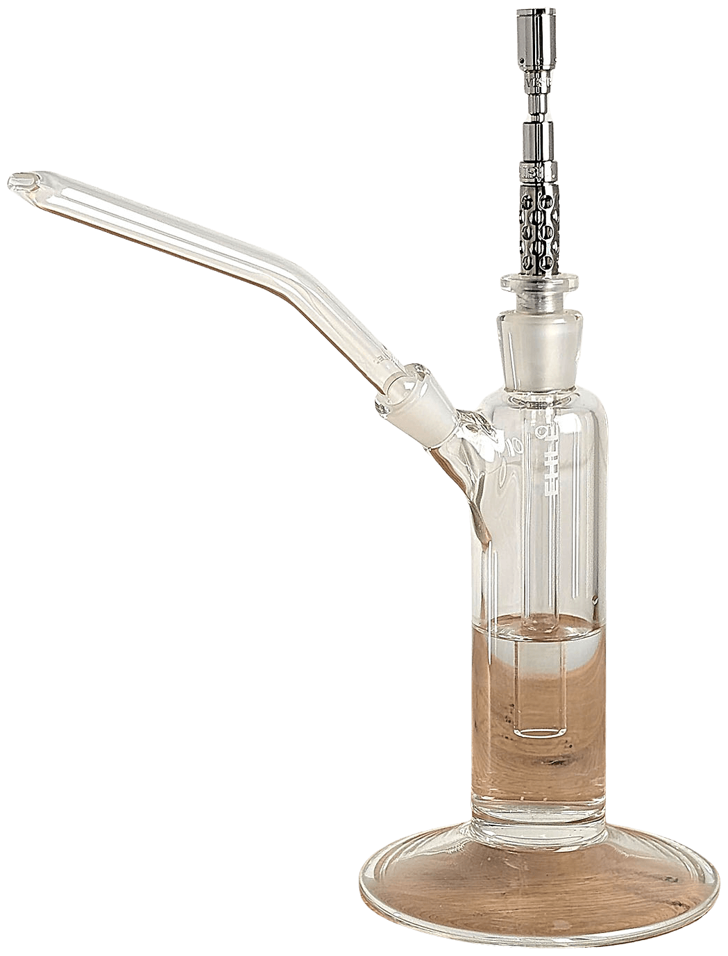 Vestratto Tornado inserted into a glass water pipe using the included 14 mm adapter