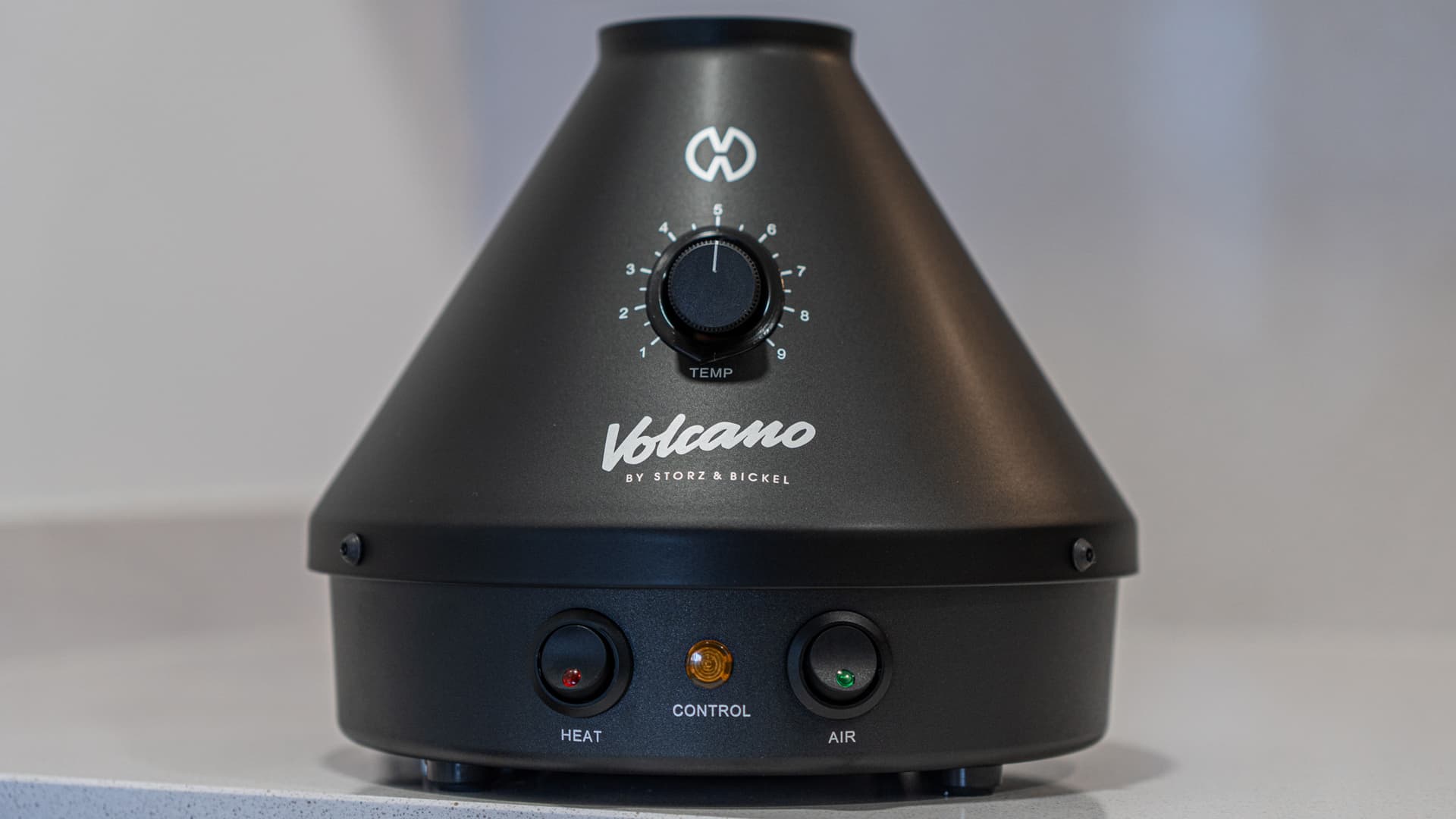 Temperature dial above the HEAT, CONTROL and AIR switches on a black Volcano Classic
