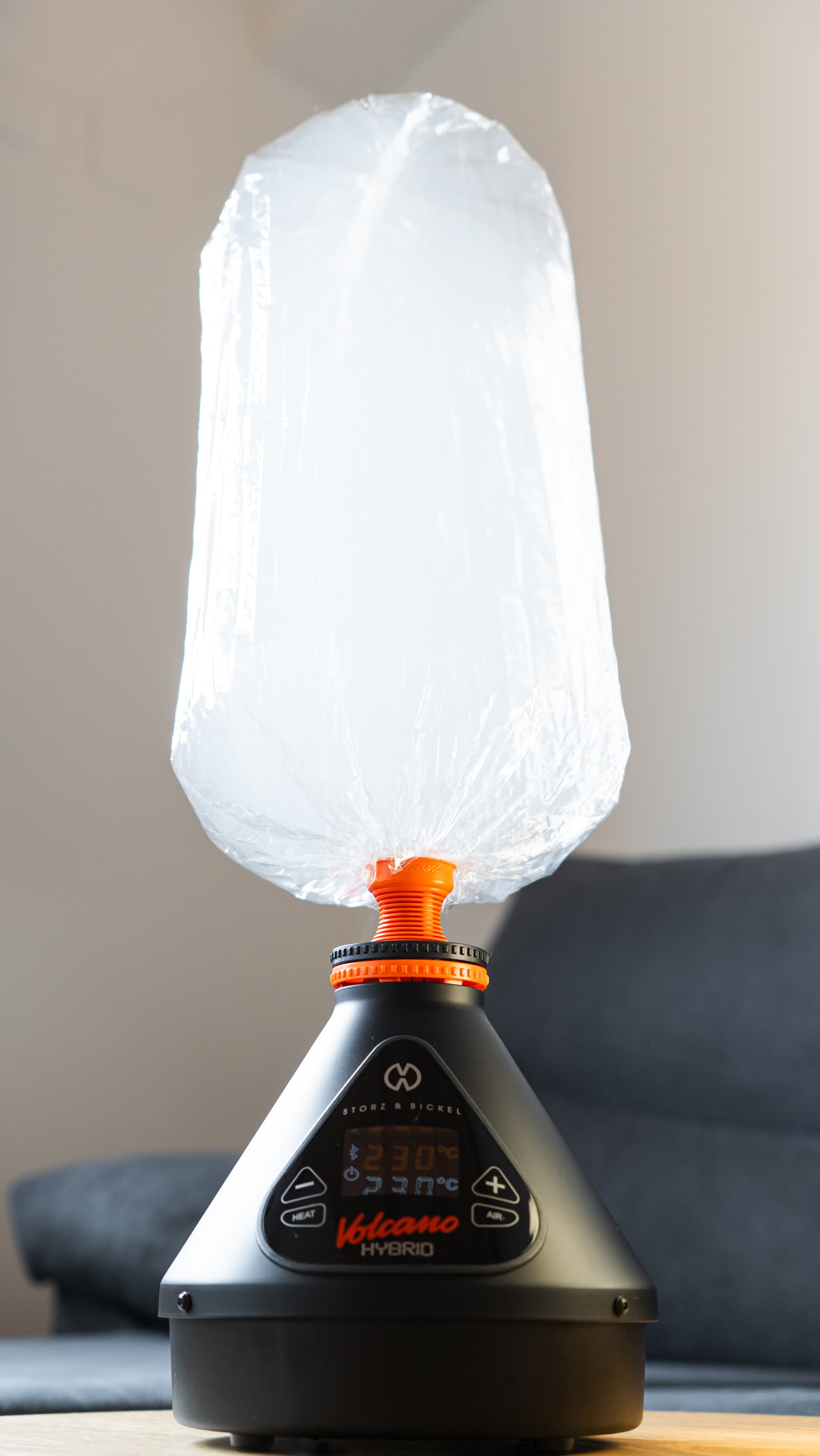 Volcano Hybrid with a dense milky balloon filled at 230°C, thick vapor visible through the clear bag