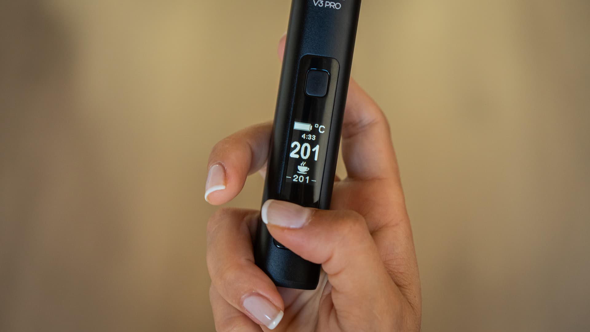 XMax V3 Pro OLED-Display zeigt 201°C und Session-Timer bei 4:33