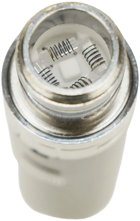 Close-up top view of Yocan Evolve Plus XL coil chamber showing quad quartz coil interior