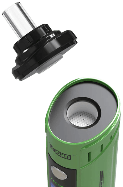 Green Yocan Hit with mouthpiece removed showing ceramic oven chamber from above
