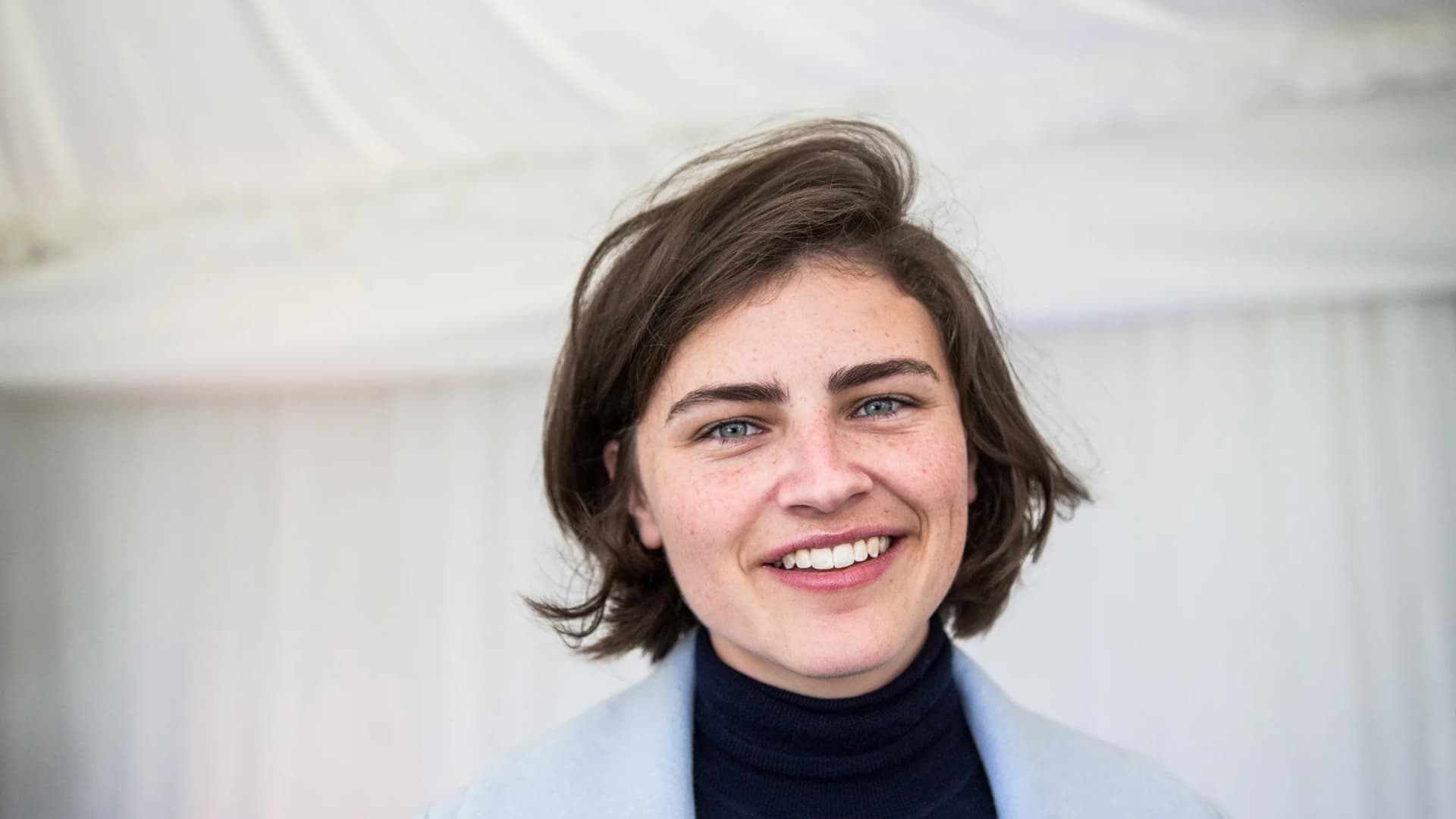 Chlöe Swarbrick, New Zealand politician and Member of Parliament, smiles during the St. Gallen Symposium 2018 at the University of St. Gallen on Friday, May 4, 2018. | dpa/picture-alliance/Newscom