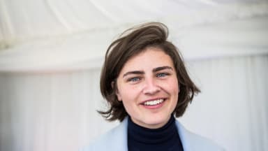 Chlöe Swarbrick, New Zealand politician and Member of Parliament, smiles during the St. Gallen Symposium 2018 at the University of St. Gallen on Friday, May 4, 2018. | dpa/picture-alliance/Newscom