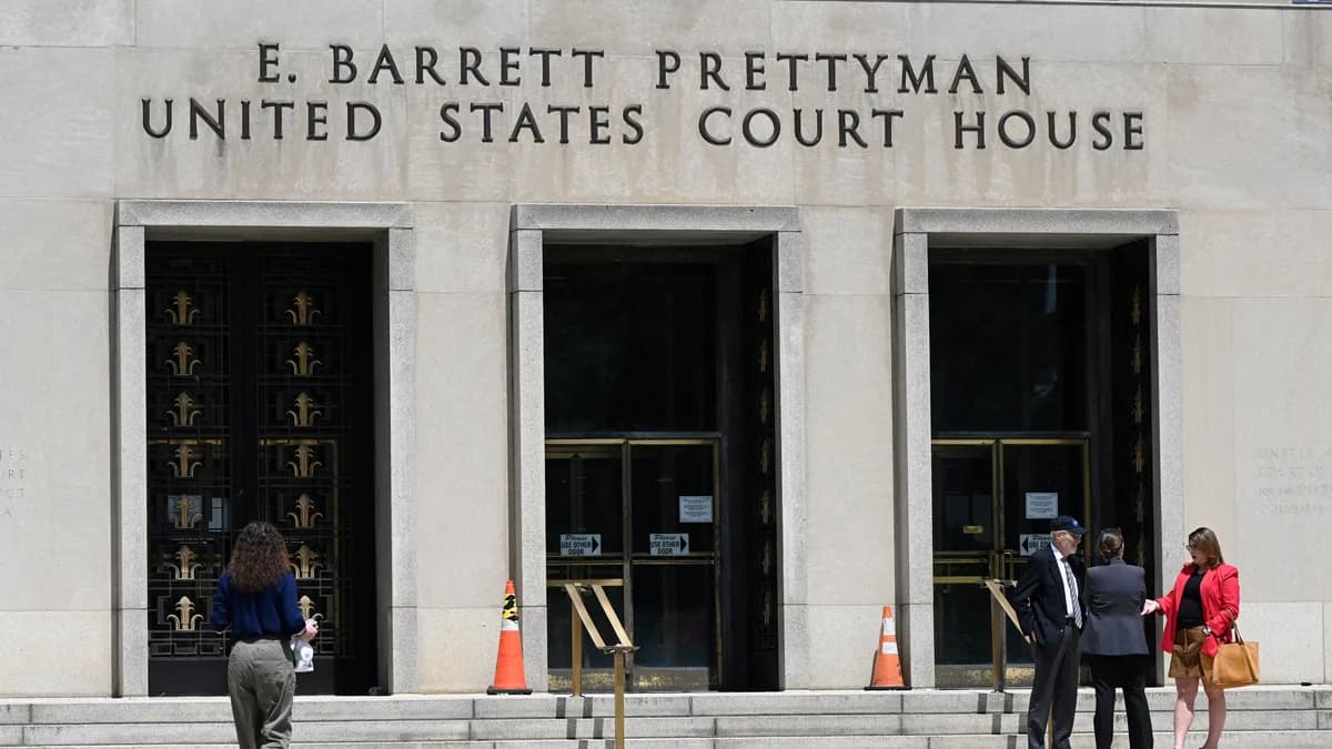 Members of the media gather outside the E. Barrett Prettyman United States Courthouse in Washington in April 2026. | Douliery Olivier/ABACA/Newscom