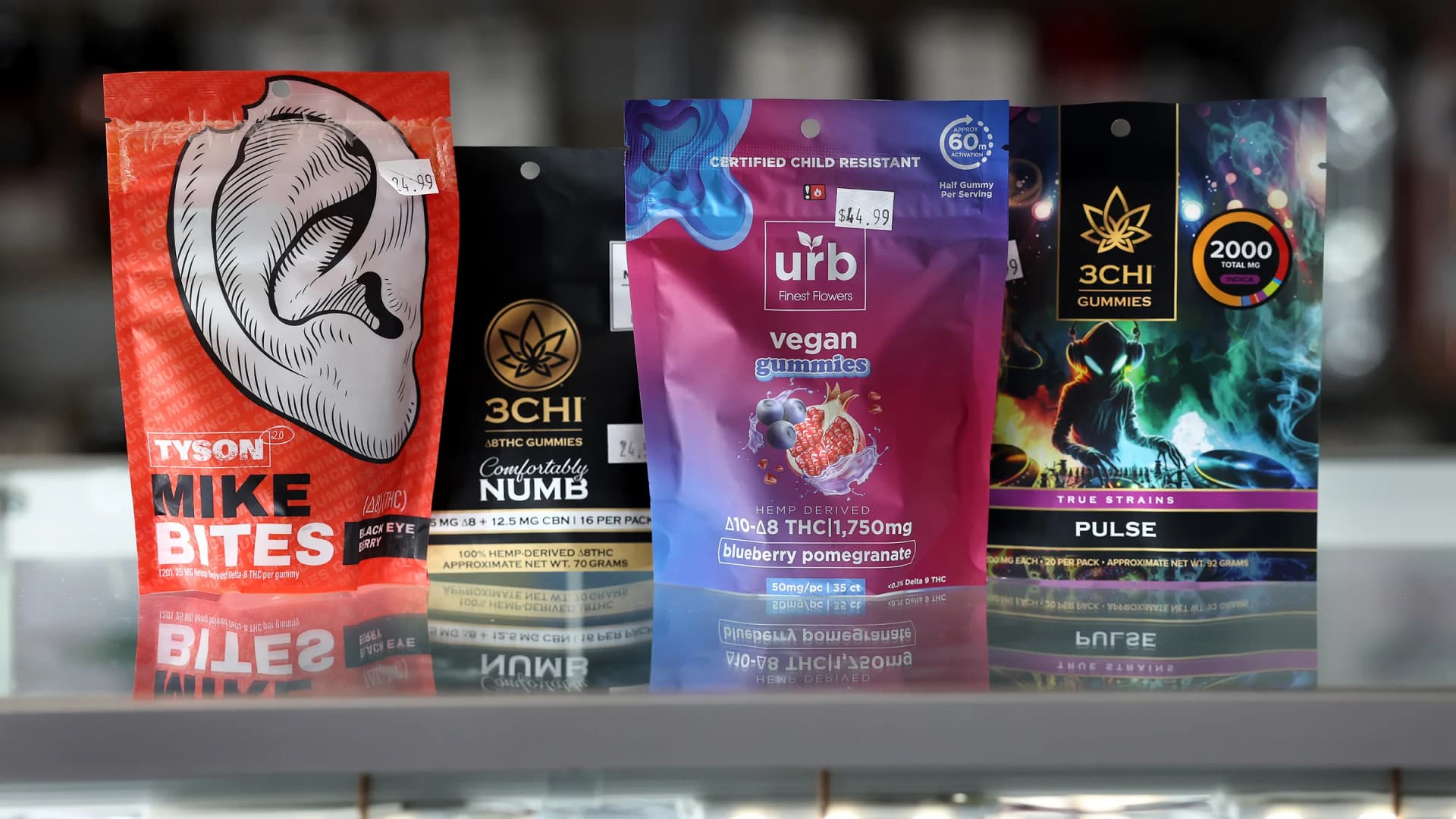 Delta-8 and delta-10 hemp gummies sit for sale at a smoke shop in Chicago's Lincoln Park neighborhood on June 25, 2025. Products like these could vanish under a federal 0.4 mg THC cap set to end the hemp vape market. (Chris Sweda/Chicago Tribune/TNS/Newscom)