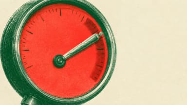 Risograph-style illustration of a large round pressure gauge whose needle is a pre-rolled joint pointing deep into a red zone, printed in grainy green and fluorescent red inks. (VapeExperts/AI)