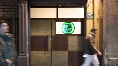 Pedestrians walk past the entrance to the 4:20 Smokers Club in Barcelona, Spain, on Dec. 27, 2015. Cannabis clubs like this one have thrived in Spain despite operating without a legal framework. (German Parga/dpa/picture-alliance/Newscom)