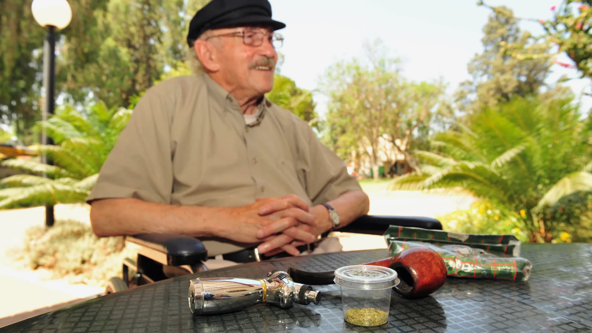 Residents of the Hadarim nursing home in Kibbutz Naan near Rehovot, Israel, smoke medical marijuana to ease their aches and pains on July 17, 2011. Rising cannabis use among seniors is prompting assisted living facilities to write new rules. (Rafael Ben-Ari/Chameleons Eye/Newscom)
