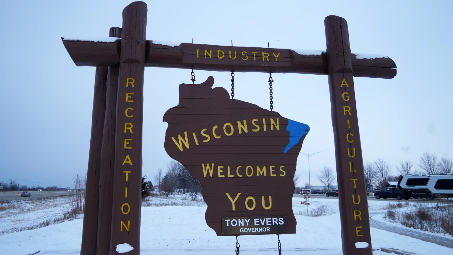 A Wisconsin Welcomes You sign bearing the name of Gov. Tony Evers stands in Beloit, Wis., on Dec. 19, 2024. The state's election results could open the door to cannabis legalization. (Image of Sport/Newscom)